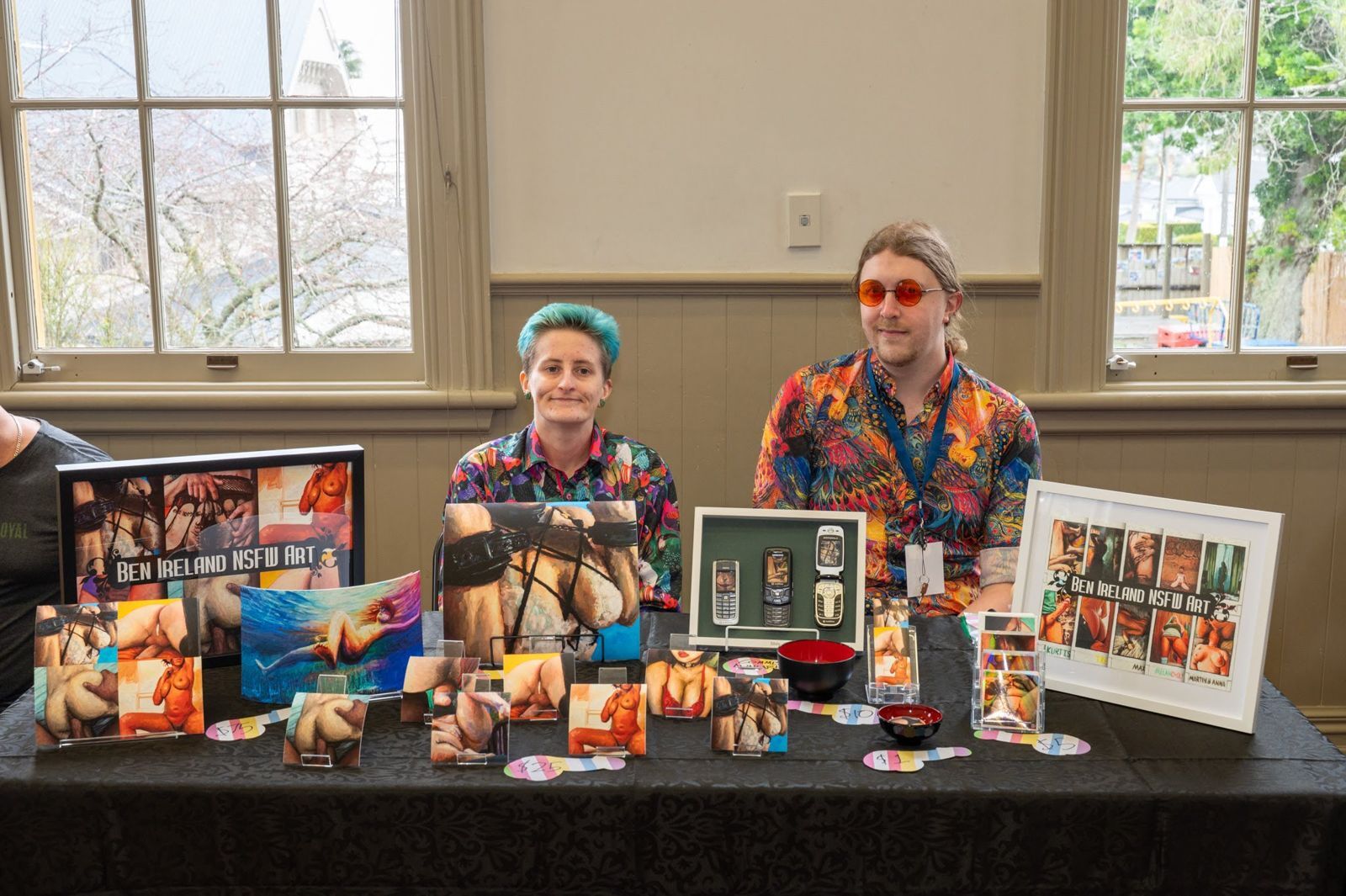 Two photographers at their stand